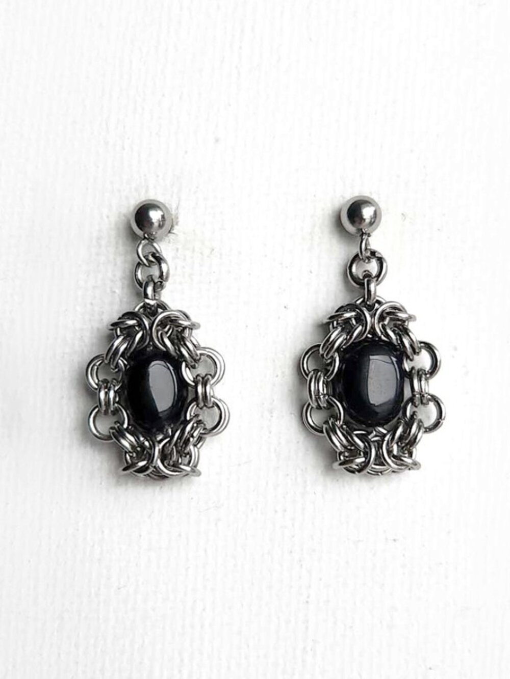 Vintage Victorian gothic style black onyx and intricate silver earrings